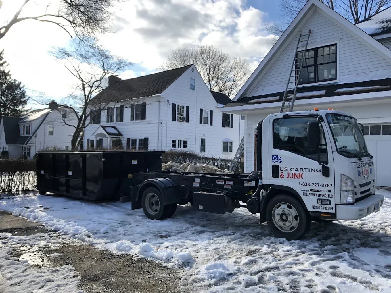 U.S. Carting roll-off dumpster truck